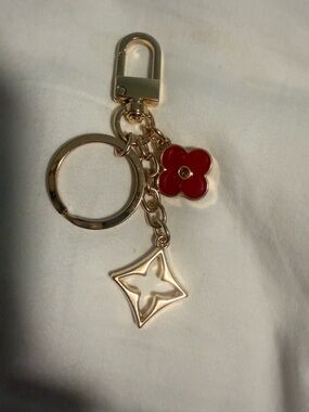 KeyChain with a hook for Bags with Red Flower Charm and gold tone accents!